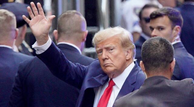 Ex-President Trump Arrested on Multiple Charges 1 trump waves